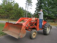 working on the tractor 2.jpg working on the tractor 2.jpg