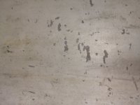 chipped epoxy floor.JPG