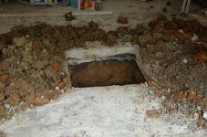 Footing inside existing garage small.JPG
