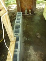 support tresses and cut short and put in cement block and done 2.jpg