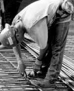 a-Deck-working-posture-b-Deck-tying-rebar.png