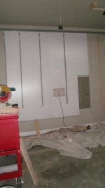 just beginnign to measure pegboard around the service panel.jpg