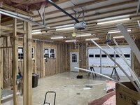 foam board in i-beams to hide fiberglass hanging down.jpg