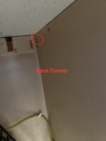 Screw in cabinet in back corner.JPG Screw in cabinet in back corner.JPG