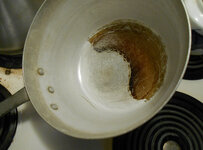 big aluminum pot after a night of chili cooking.jpg