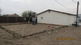 Pouring footings.JPG