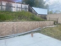 Retaining wall view to the end near back wall.jpg