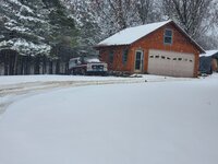 78 ford and snow by garage.jpg