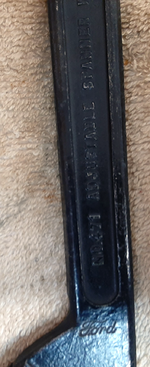 Williams Ford script spanner wrench - close-up of Ford script.png