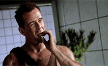 bruce-willis-smoking.gif