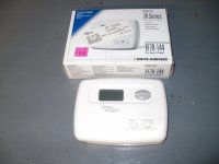 New White Rodgers digital thermostat and box.jpg