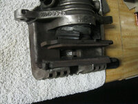 Old Caliper with Pads 1.jpg Old Caliper with Pads 1.jpg
