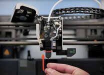 push_the_pin_to_unclog_the_hotend.jpg