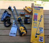 Dewalt DCST972X1 60V Trimmer and two 9AH 60V batteries.jpg