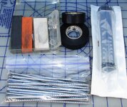 crews-giant-syringe-black-tape-3-sharpenign-stones.jpg