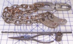 A1- Lift chain Crestalloy NN log drill bit SM impact.jpg