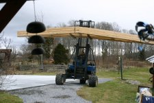 Unloading trusses.JPG