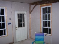 barn up to aug 5 drywall entry door.jpg