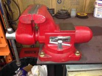 snap on vise with mounting bolts welded into steel plate bench top.jpg