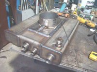 new water heater ready to mate with stove.JPG