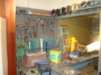 peg board painted and tools starting to go up.JPG