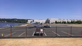 float plane with cool half truck towing it at Renton Airport.jpg