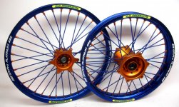 CC_KTM_Wheel_Set-Orange_Hub-Blue_Spokes-Orange_Spoke_Nipples-Blue_Platinum_Rim.jpg