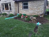 FrontPlanterDownSpouts.jpg FrontPlanterDownSpouts.jpg