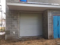 RV barn back door 1 rollup stucco lathe.jpg