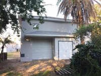 RV barn back door 5 stucco banding painted.jpg