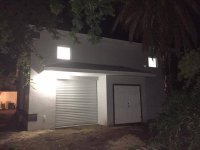 RV barn back door 6 paint finished night with lights.jpg