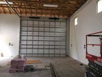 RV barn front garage door inside after installation.jpg