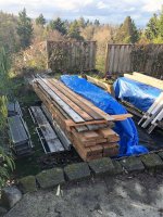 2x8's in wood pile re stacked (2).jpg