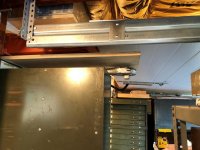 railing too low hence cutting oak cabinet.jpg