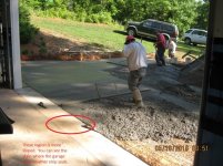 Garage Slab Slope Edge At Garage Door.jpg