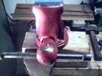 old under bench mount fairly small with badge on hub.jpg