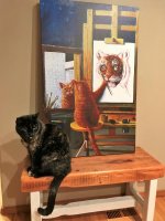 cleo on bench with cat tiger picture.jpg