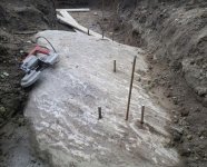 short rods into the footing and long one up into the wall.jpg