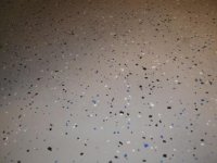 Garage bathroom floor closeup.JPG