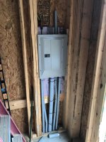 Conduits connected to panel with framing shown.jpg