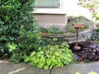 Cast iron bird bath about 3 feet tall.jpg