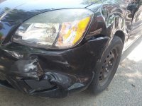 2010 Kia Rio LX - Left Front Bumper Damage.jpg