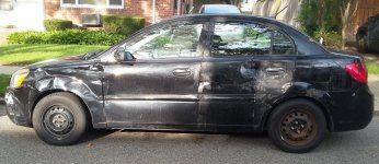 2010 Kia Rio LX - Left Body Damage.jpg