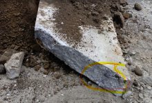 Snapped a section of wall off for future sump pump. Steel broke off.jpg