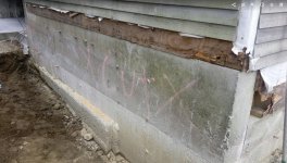 Wall section that is being removed. Area cleared for the wall to fall into..jpg