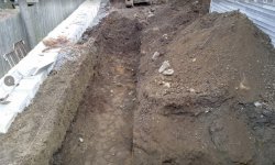 starting the west wall along the propert line..jpg