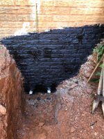 Cleaned and Tarred Foundation Wall.jpg