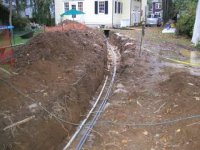 Garage trench conduit compressed.jpg