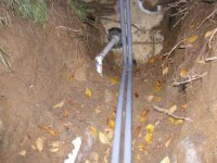 Garage trench conduit into house compressed.jpg