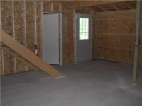 unfinished downstairs room future kitchen, bath, utility.jpg